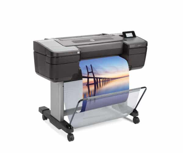 HP DesignJet Z9ps 24-in A1 printer - photo shows the printer with a printout dropping into the media basket and gives an impression of the size of the printer and the capability and typical user output